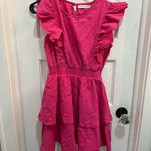 Pink ruffle dress from Nickilam in a size small